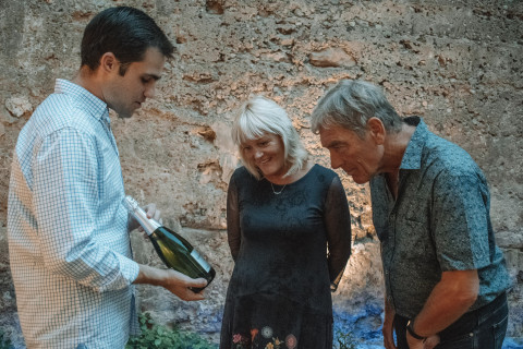 Host Explaining The Wines